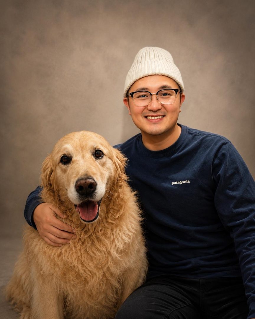 Alan Chang, Co-founder at Alerte Digital Vet, photographed with their pet